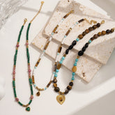 Close-up of bohemian style energy necklace with natural stones